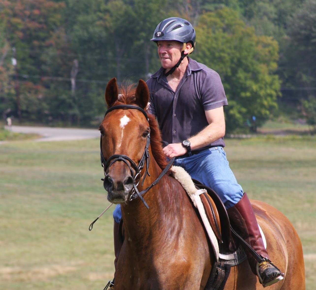 Dr. Ron Vin riding a horse